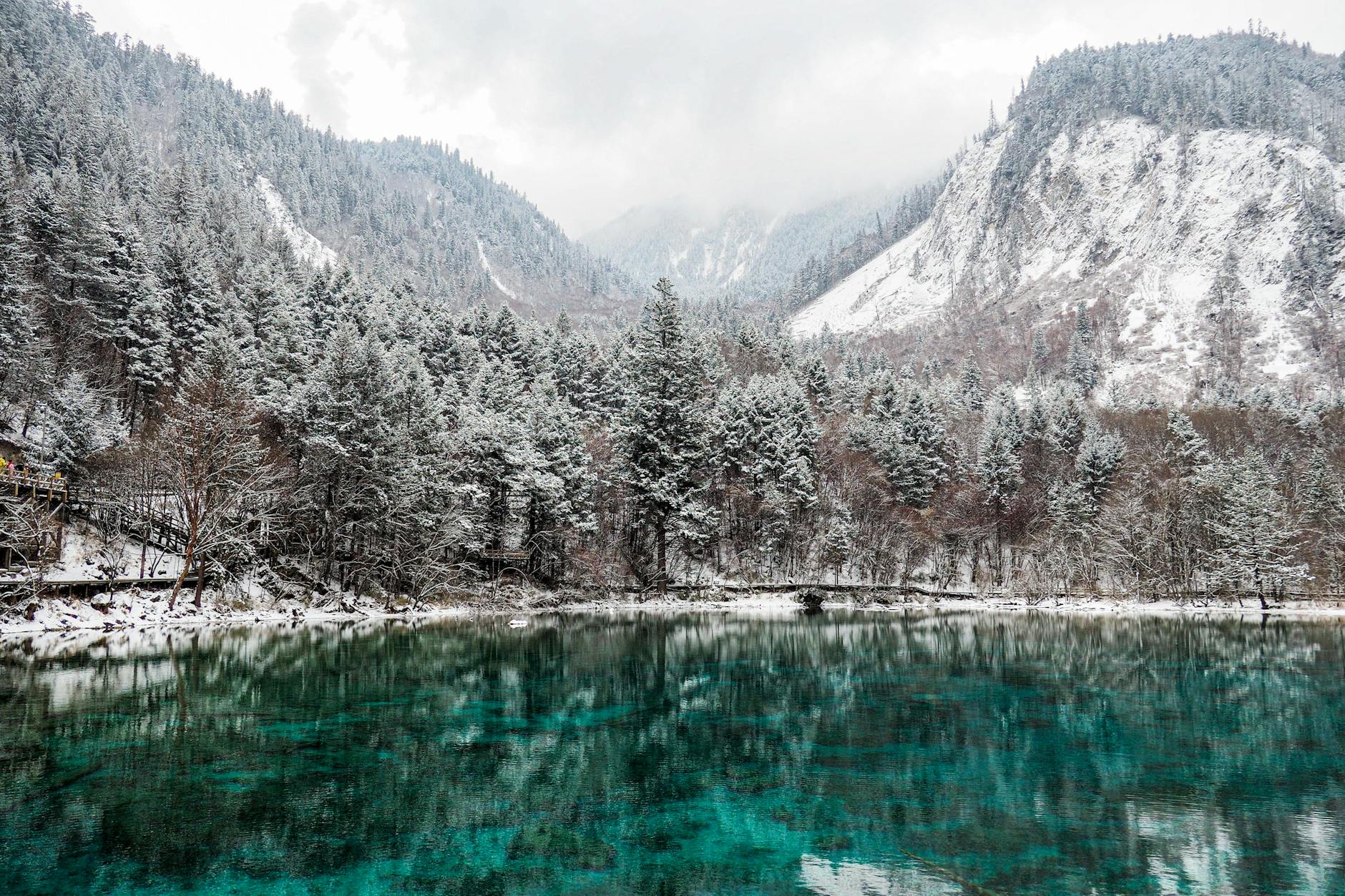 serene winter landscape with snow covered mountains